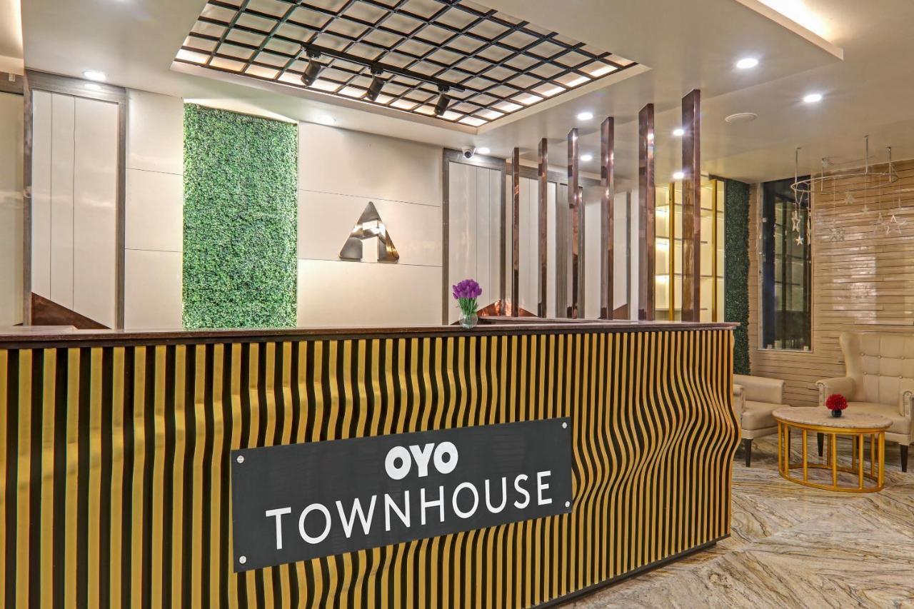 Super Townhouse Hotel Impact Chinhat المظهر الخارجي الصورة