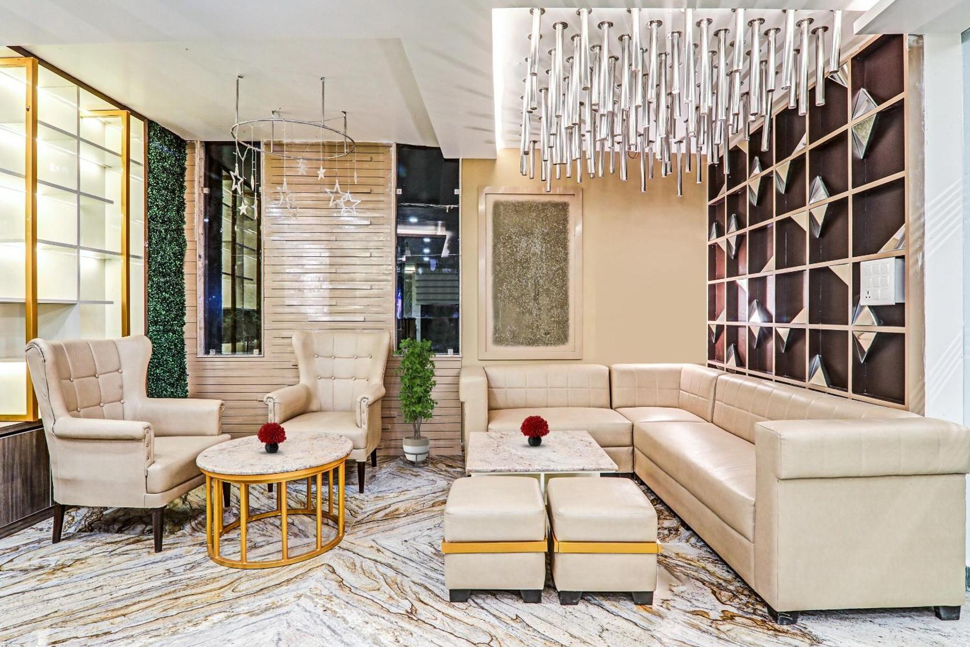 Super Townhouse Hotel Impact Chinhat المظهر الخارجي الصورة